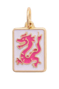 Gold pendant with pink dragon design on a white background