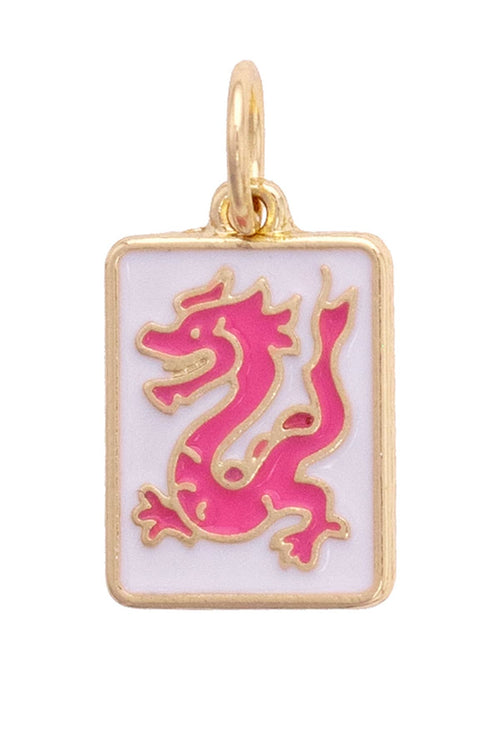Gold pendant with pink dragon design on a white background